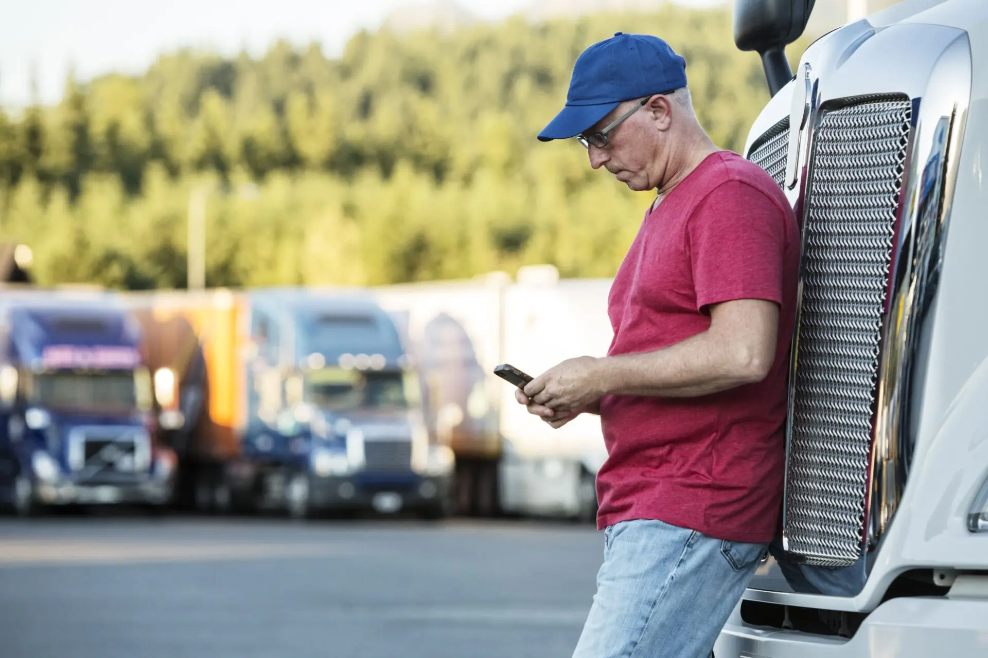 Caucasian man truck driver texting while standing 2026 03 25 00 53 47 utc (1)