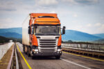 Orange truck on a road