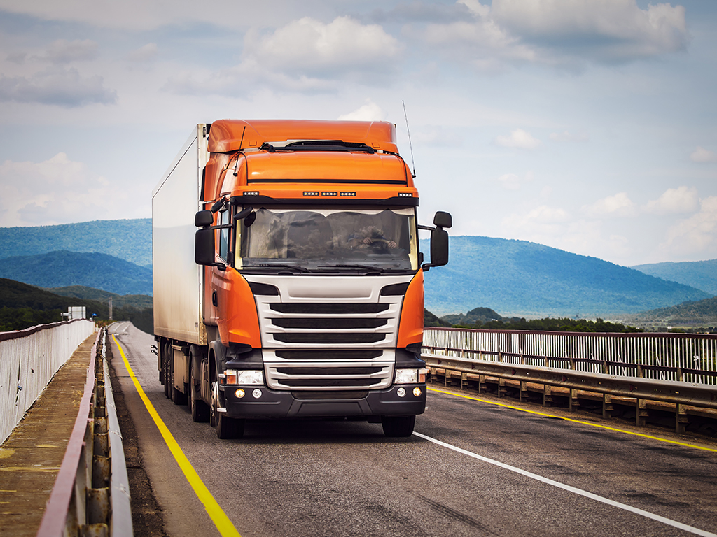 Orange truck on a road