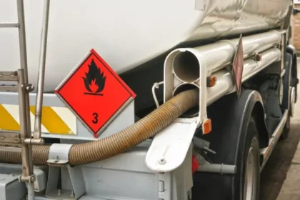 Red warning hazmat flammable class 3 liquid sign back fuel truck petrol station 602x400