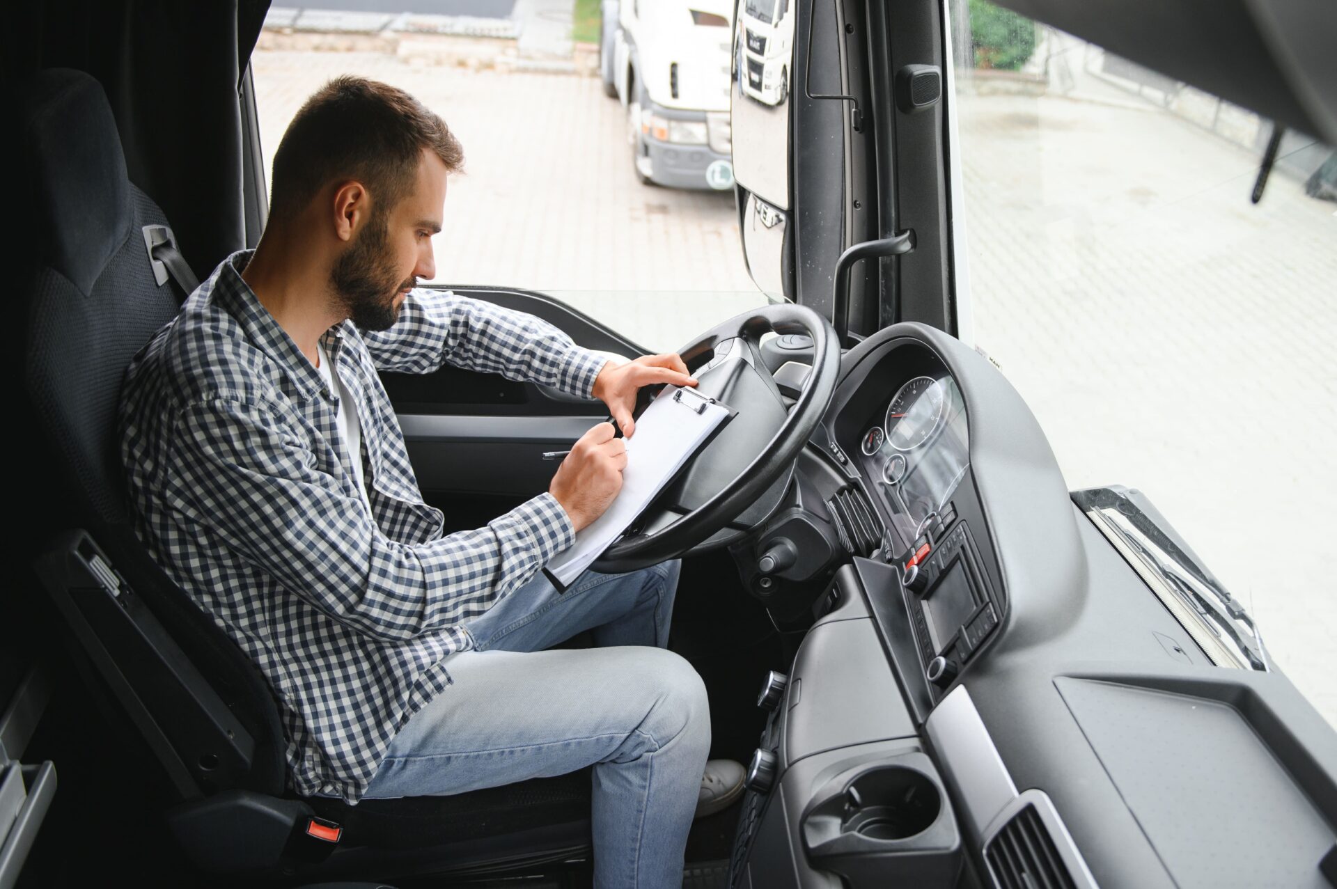 Truck driver sitting in cab 2026 03 24 04 47 41 utc (1)